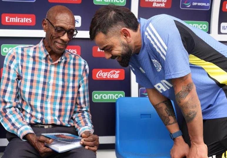 Virat Kohli with West Indies legend Wesley Hall